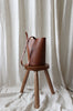 Runde Bucket Bag aus Leder in braun